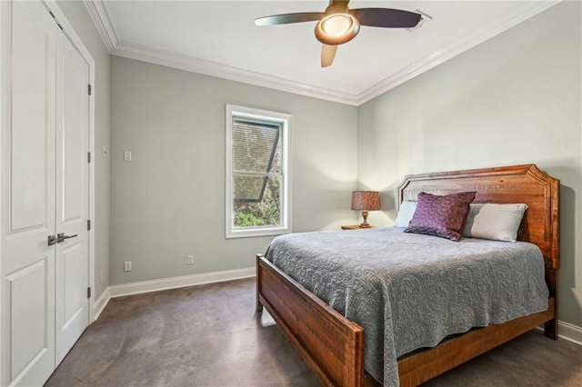 carpeted bedroom featuring ornamental molding, ceiling fan, and a closet