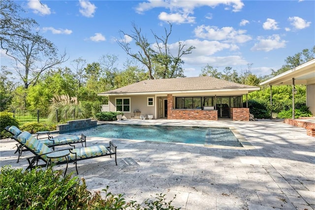 view of pool featuring a patio area