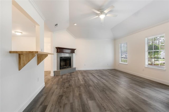 unfurnished living room with ornamental molding, lofted ceiling, dark hardwood / wood-style floors, and ceiling fan