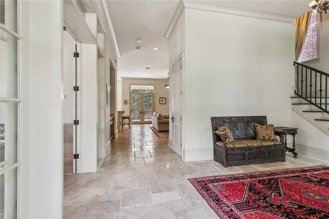 hallway featuring crown molding and french doors