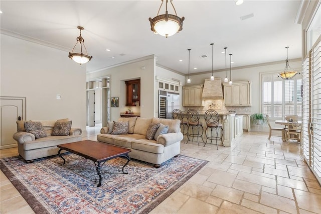 living room featuring crown molding