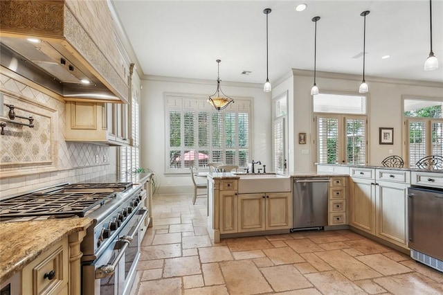 kitchen with premium range hood, a wealth of natural light, hanging light fixtures, and appliances with stainless steel finishes