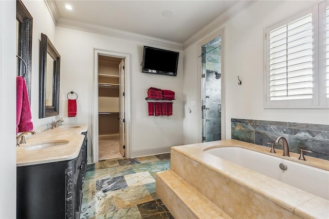 bathroom with vanity, shower with separate bathtub, and ornamental molding