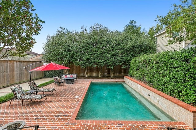 view of pool with a patio area