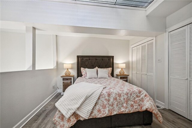 333 Julia St Unit 516, New Orleans, LA 70130 - bedroom with wood finished floors