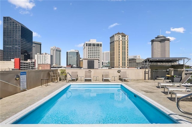 333 Julia St Unit 516, New Orleans, LA 70130 - community pool featuring a patio area and a skyline view