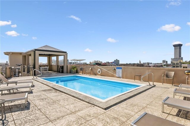 333 Julia St Unit 516, New Orleans, LA 70130 - community pool featuring a gazebo and a patio
