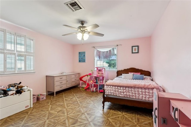 bedroom with parquet flooring and ceiling fan