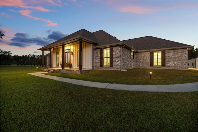 view of front of house with a lawn