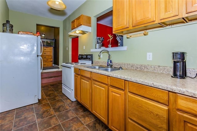 kitchen with white appliances and sink