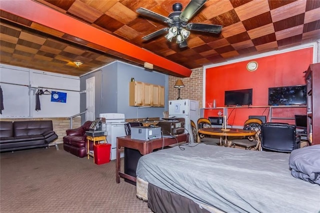 carpeted bedroom featuring ceiling fan, white fridge, wooden ceiling, and brick wall