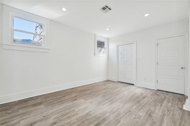 unfurnished bedroom featuring light hardwood / wood-style floors