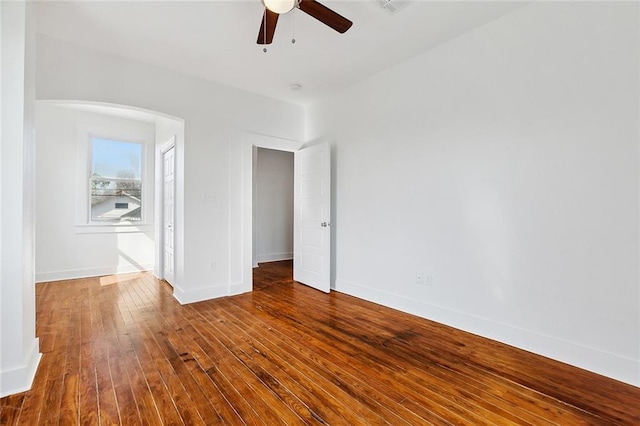 interior space with ceiling fan and wood-type flooring