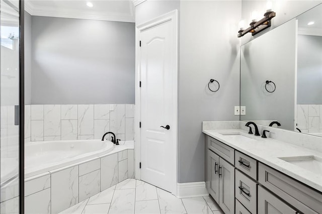 bathroom featuring ornamental molding, vanity, and tiled tub