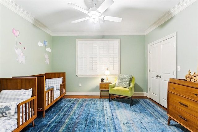 bedroom featuring ornamental molding, ceiling fan, and dark hardwood / wood-style floors