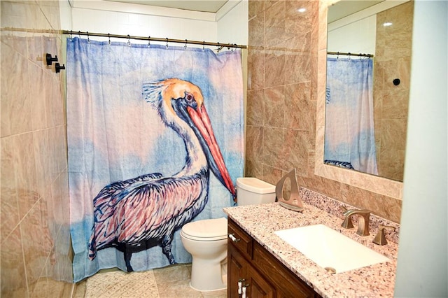 bathroom with tile walls, tile patterned floors, vanity, a shower with shower curtain, and toilet