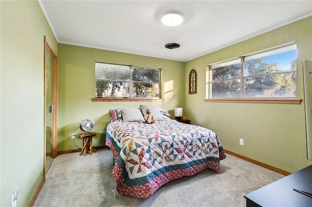 bedroom featuring carpet and crown molding