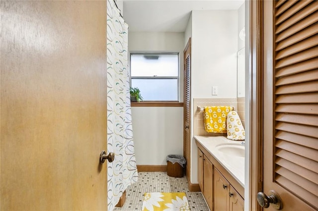 bathroom with vanity and tile patterned floors