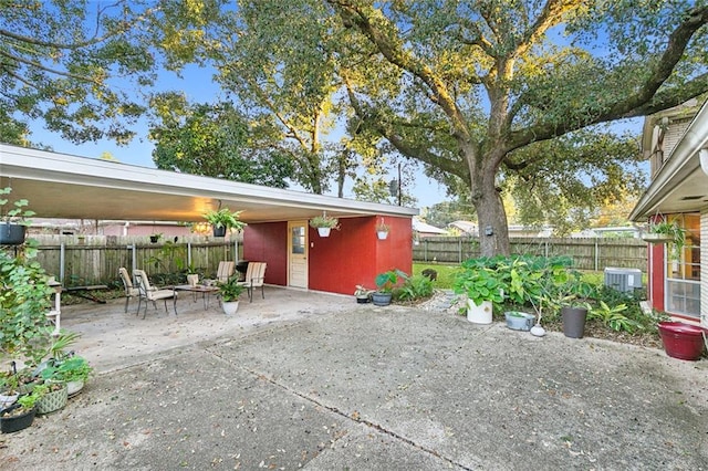 view of patio with central AC