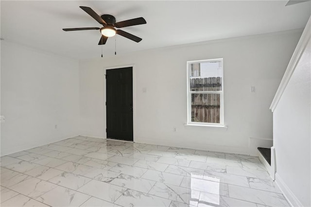 unfurnished room with ceiling fan