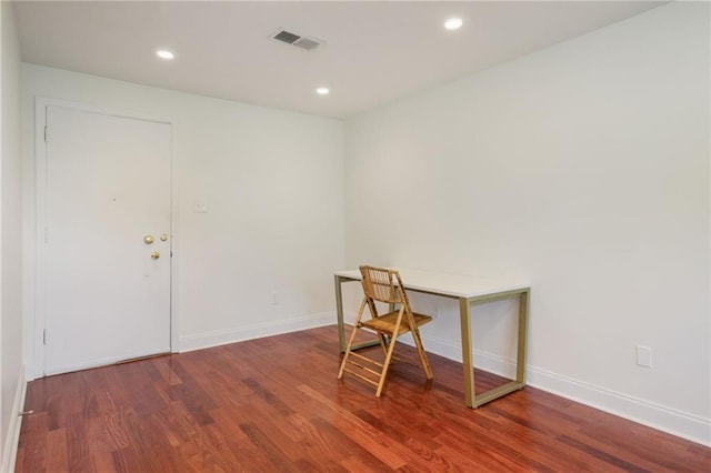 home office featuring dark hardwood / wood-style flooring