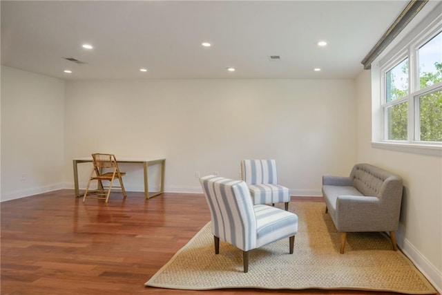 living area featuring hardwood / wood-style flooring