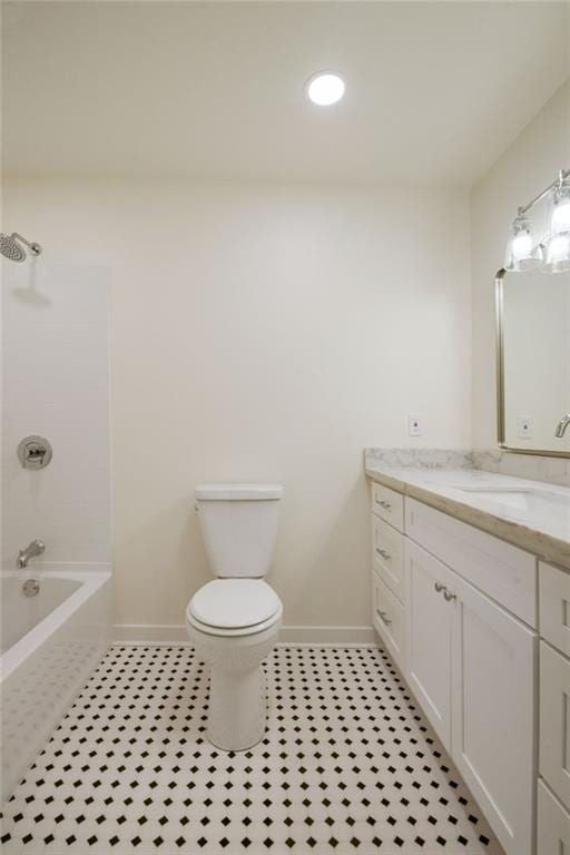 full bathroom featuring vanity, tile patterned floors, toilet, and bathtub / shower combination