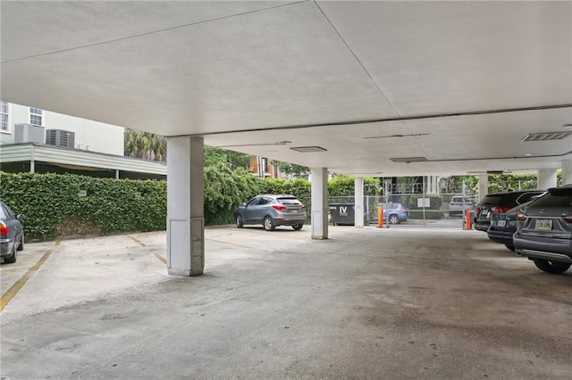 garage featuring a carport