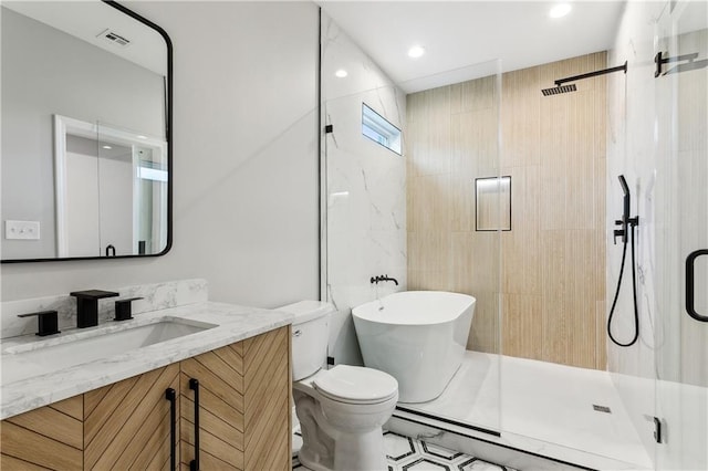 full bathroom featuring vanity, toilet, and plus walk in shower