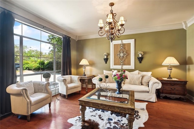 living room with ornamental molding, baseboards, an inviting chandelier, and dark wood-style floors