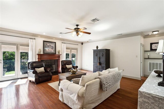 miscellaneous room with plenty of natural light, light hardwood / wood-style floors, ornamental molding, and ceiling fan