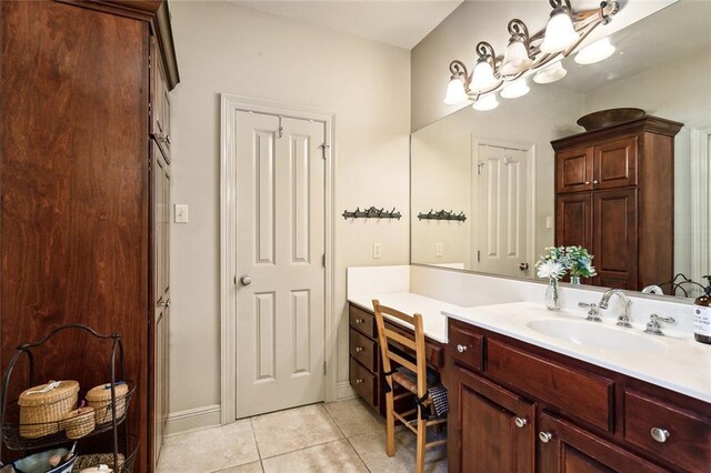 bathroom featuring tile patterned floors, vanity, and separate shower and tub