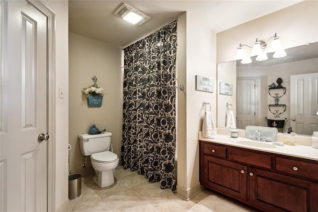 bathroom with toilet, tile patterned floors, visible vents, and vanity