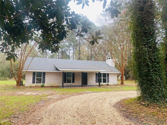 ranch-style house with a front yard