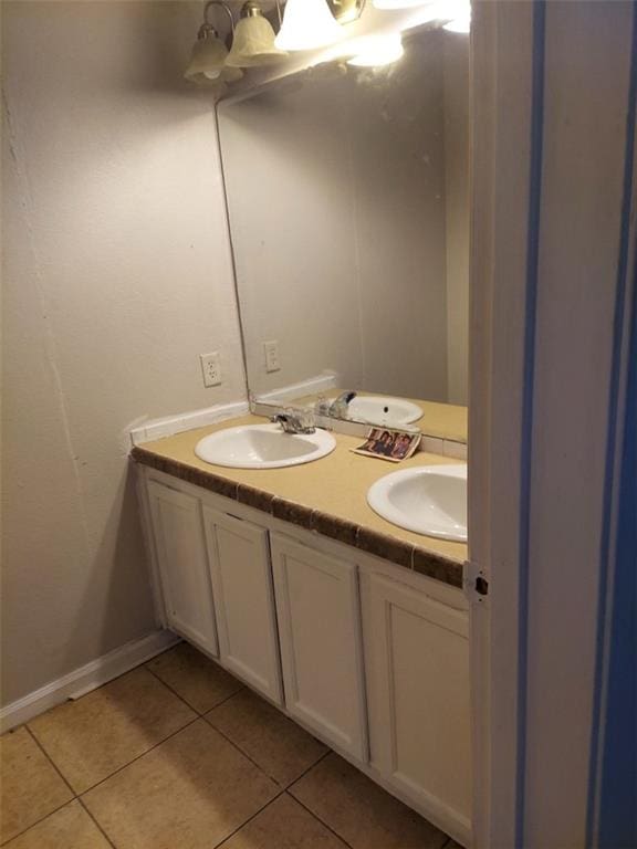 bathroom with vanity and tile patterned floors