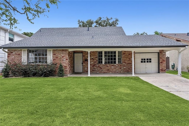 single story home featuring a porch, a garage, and a front yard