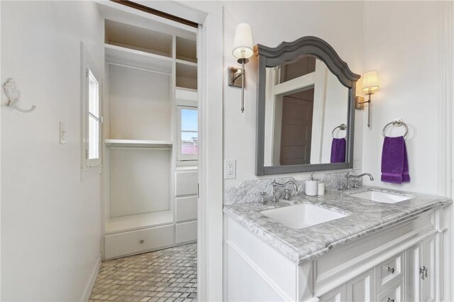 820B Saint Ann St, New Orleans, LA 70116 - bathroom with baseboards and double vanity
