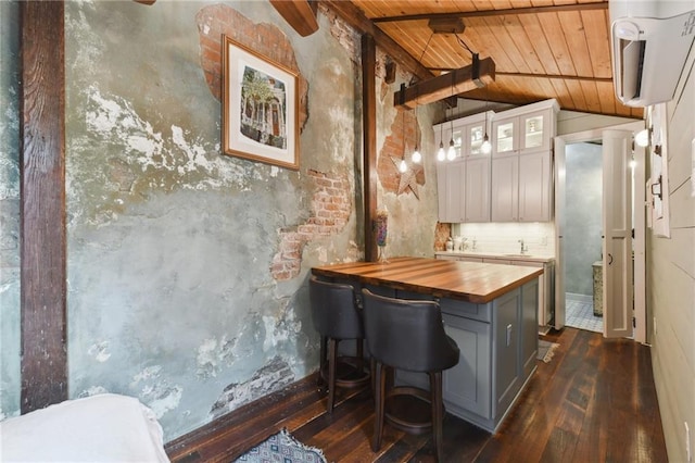 bar featuring wooden counters, wood ceiling, white cabinets, dark wood-type flooring, and vaulted ceiling