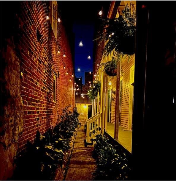 820B Saint Ann St, New Orleans, LA 70116 - property exterior at twilight with brick siding
