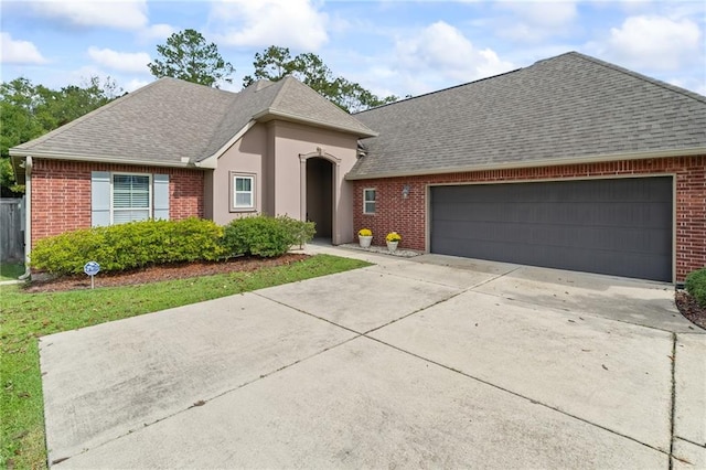 view of front of home with a garage