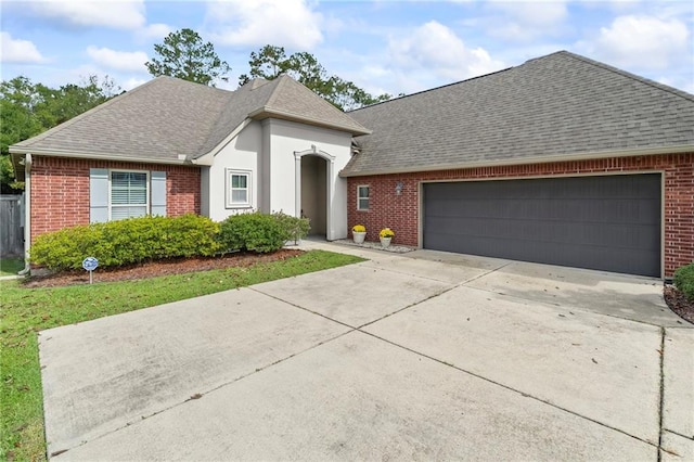 view of front of property featuring a garage