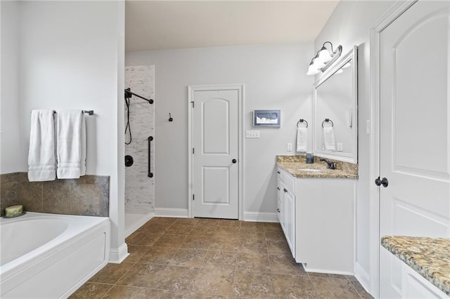 bathroom with shower with separate bathtub and vanity