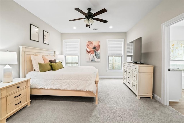 carpeted bedroom with ceiling fan