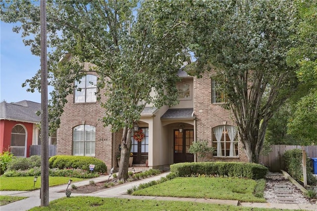 view of front of home with a front yard