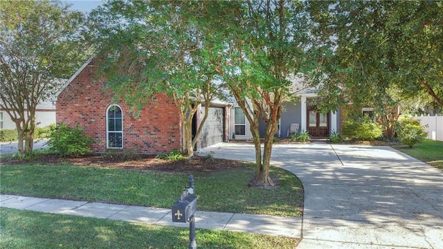 view of property hidden behind natural elements