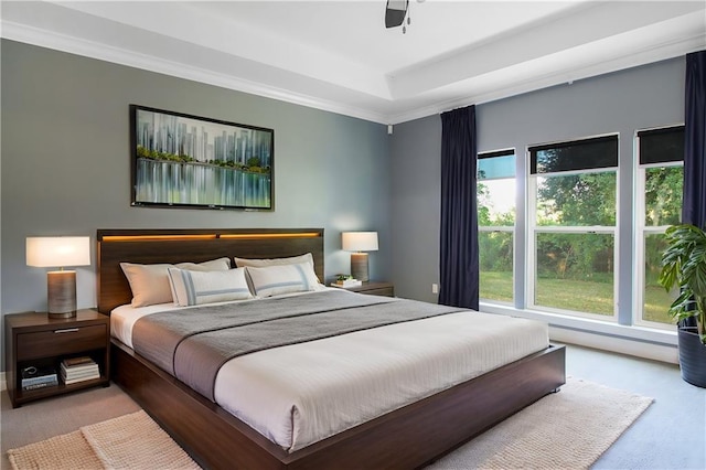 bedroom with ceiling fan and ornamental molding