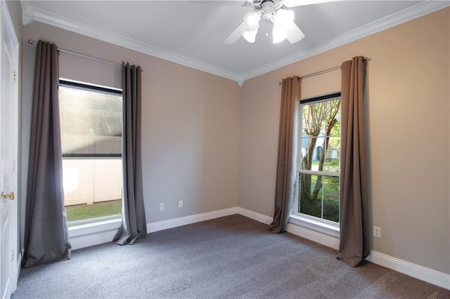 carpeted empty room with ceiling fan and ornamental molding