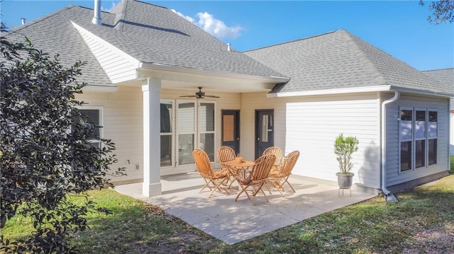 rear view of house with a patio and ceiling fan