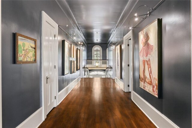 hallway featuring wood-type flooring