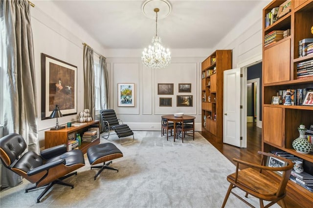 sitting room with a chandelier